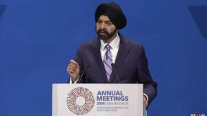 World Bank President Ajay Banga speaking at 2024 annual meeting in Washington, promoting electricity for development.